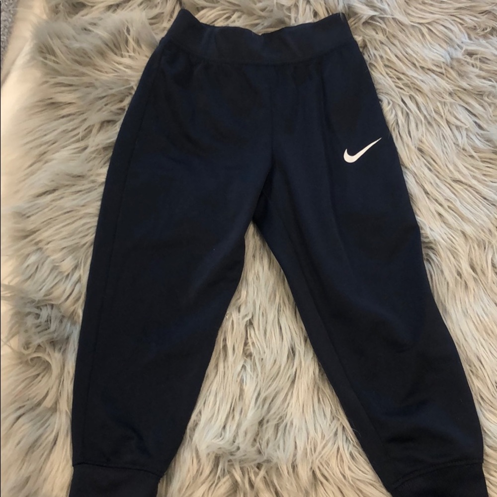 Blue nike track pants